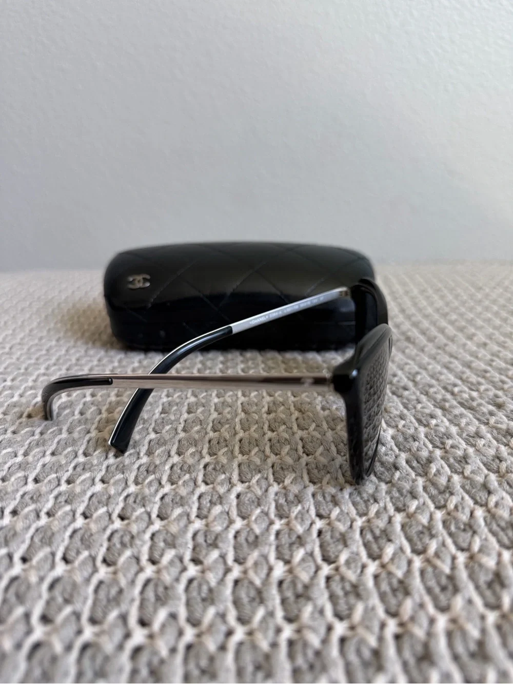 CHANEL Black Cat-Eye Sunglasses with Quilted Logo Case